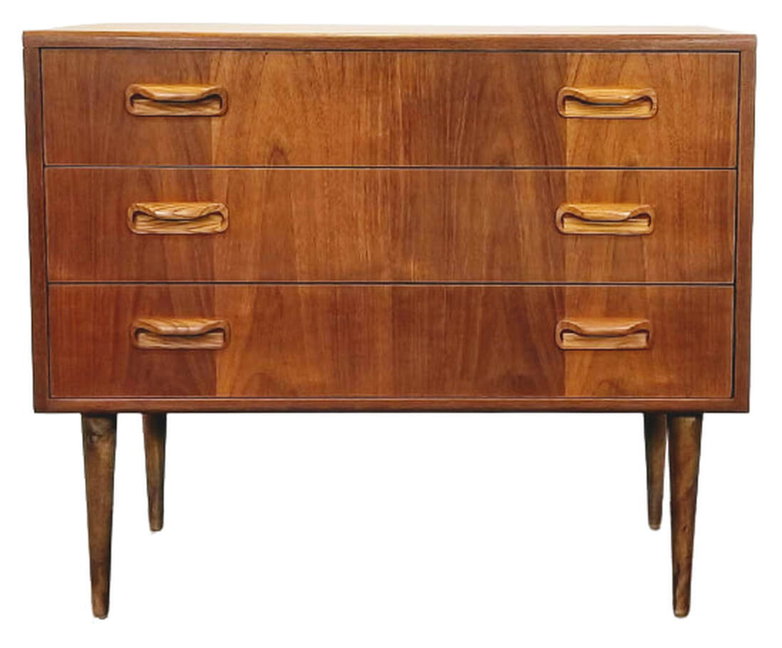 Mid-Century UK Modern three-drawer dressing chest on tapered peg legs designed by V.B. ( Victor Bramwell ) Wilkins for Ebenezer Gomme's G-Plan Fresco Range. Carcase is teak veneered with African afrormosia wood solids.