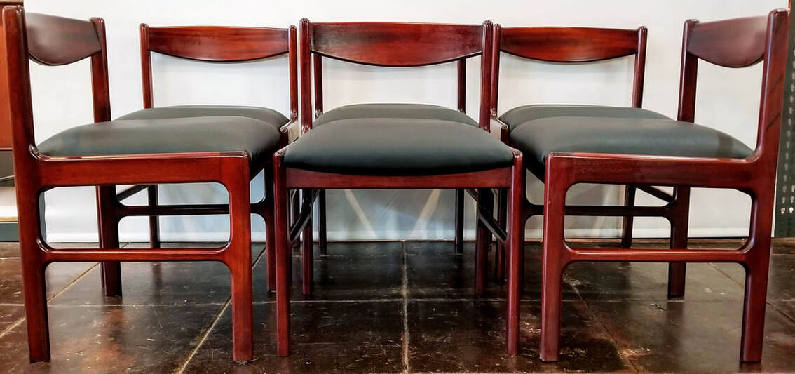 Set of six rosewood low-back vintage Danish Modern dining chairs designed by Tom Roberts for McIntosh, Kirkcaldy, Scotland.