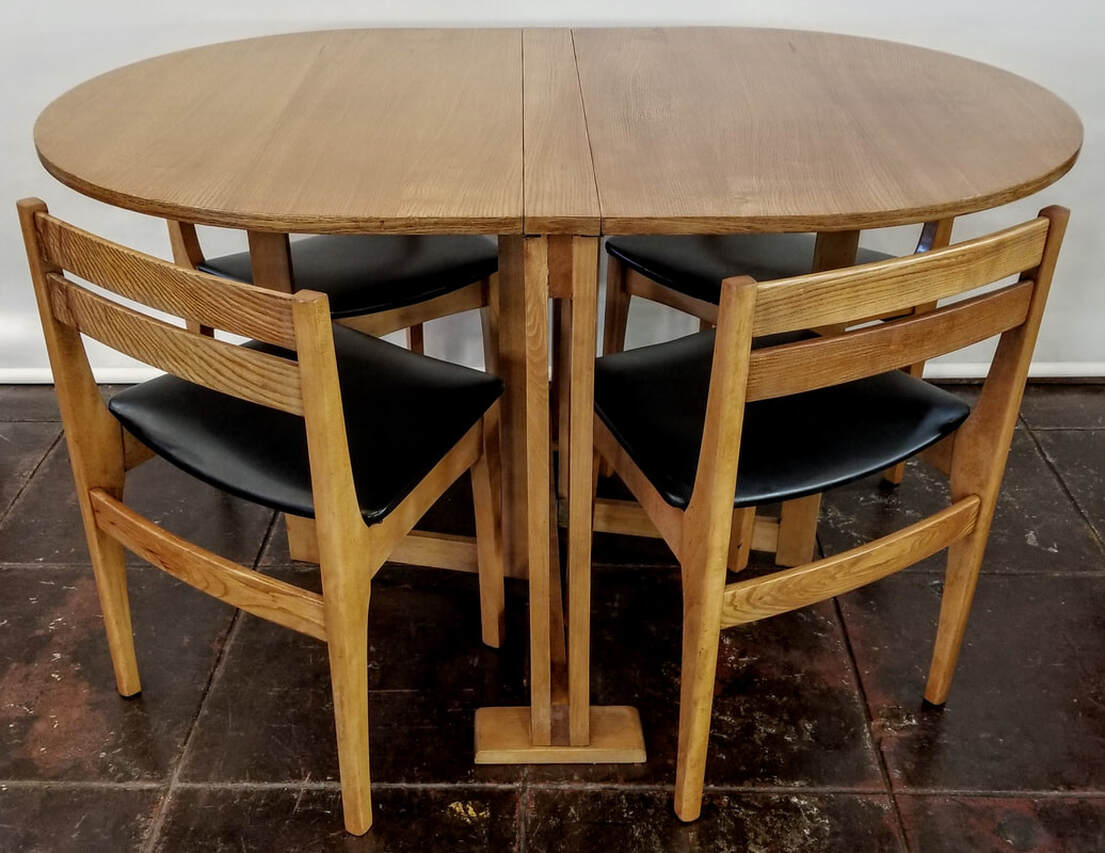 Teak Dining Table and Chairs | Vintage Norwegian Modern Compact table and chairs are excellent options for small space living. The gateleg drop-leaf table takes up just 9
