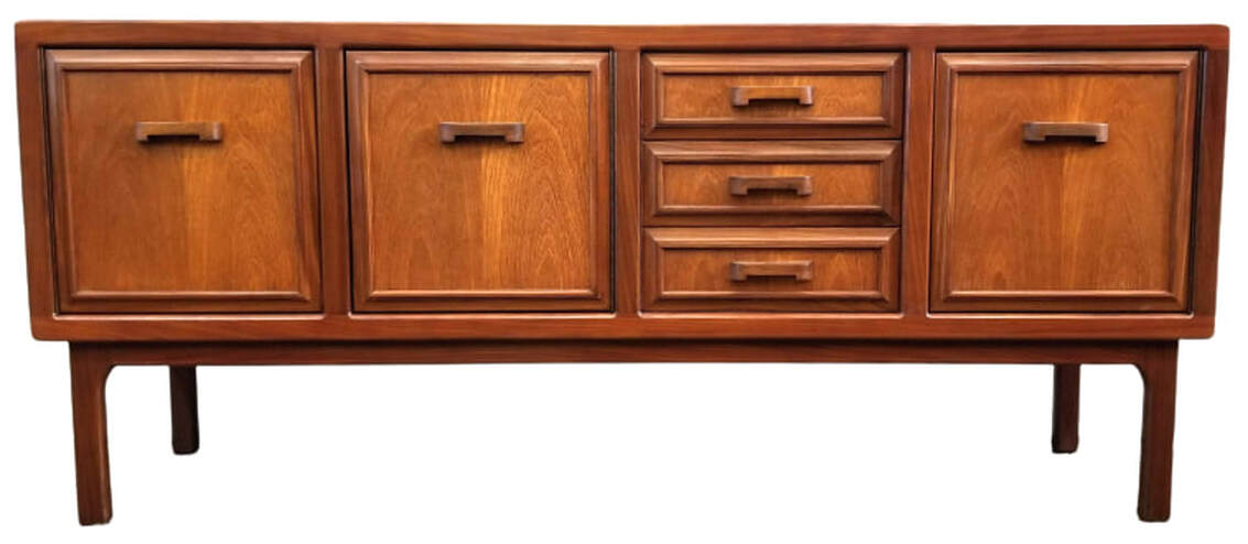 William Lawrence of Nottingham Credenza | England Southeast Asian crown-cut teak and African Afrormosia trim and legs. Two single door cabinets are on the left side. Three drawers are right of center. One single door cabinet is on the right.