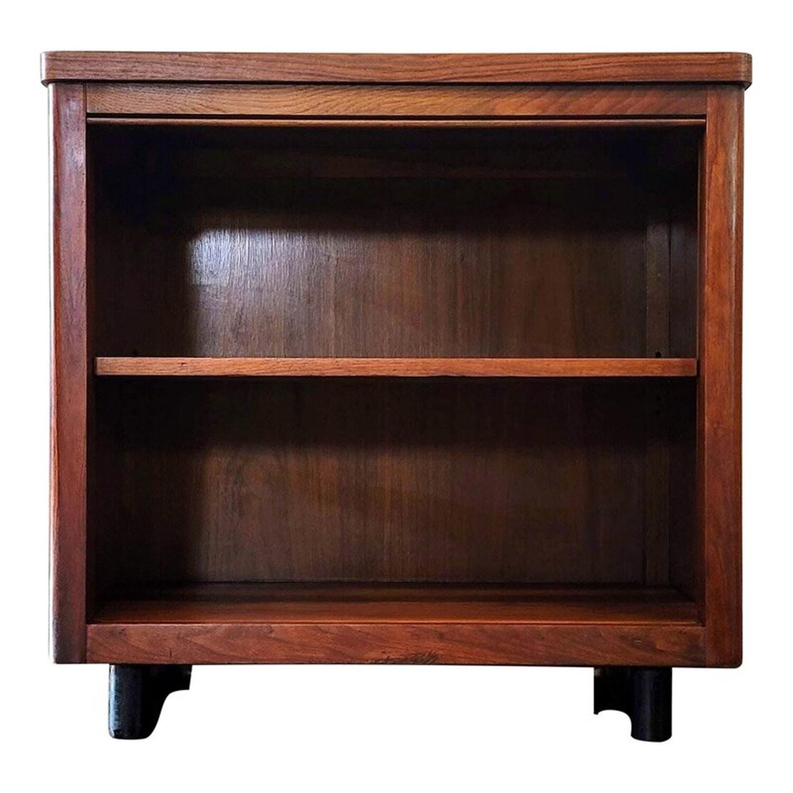 Alma Desk Company walnut bookcase with ebonized feet. 30ʺW × 16ʺD × 29.25ʺH.