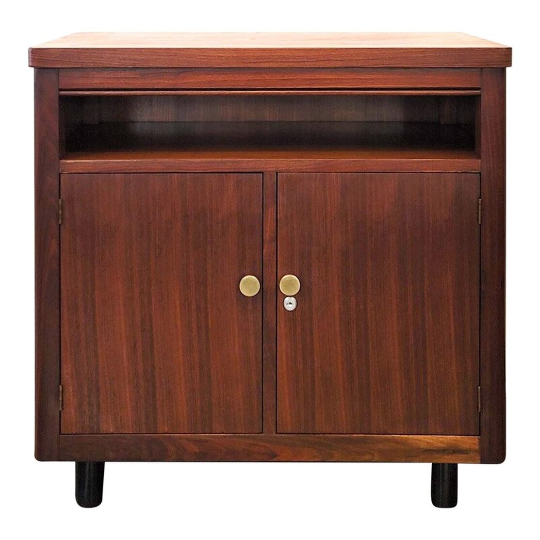 Alma Desk Company walnut double-doored cabinet on ebonized feet.