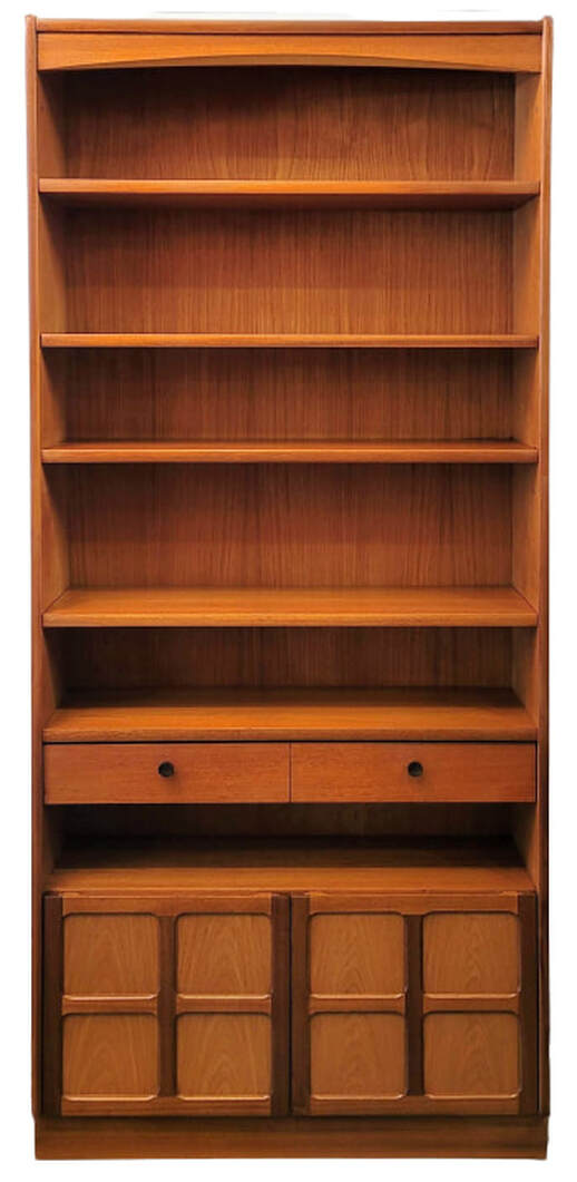Nathan Furniture Classic Teak Finish Range tall bookcase offers four adjustable shelves; one storage drawer; one standard shelf; and a double-doored storage cabinet on a plinth base. The flat top offers further display and storage. The top shelf is under a gently curved arch. The cabinet doors are signature Nathan Jacobean inspired simplified cruciform framed paneling. Originally designed for Nathan in 1971 by Patrick Lee, the design was an instant hit and remains an icon of Nathan Furniture. The bookcase is built from sustainably sourced Tectona Grandis teak wood. Nathan chooses teak for its quality and character in order to present perfectly matched figures that showcase special beauty and individuality.