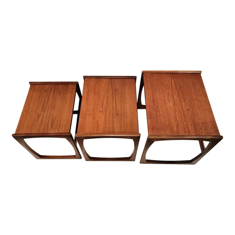 Group of three nesting tables with squircle supports designed by Roger Bennett for G-Plan's 1965 Quadrille Range. Available from Danish Modern San Diego.